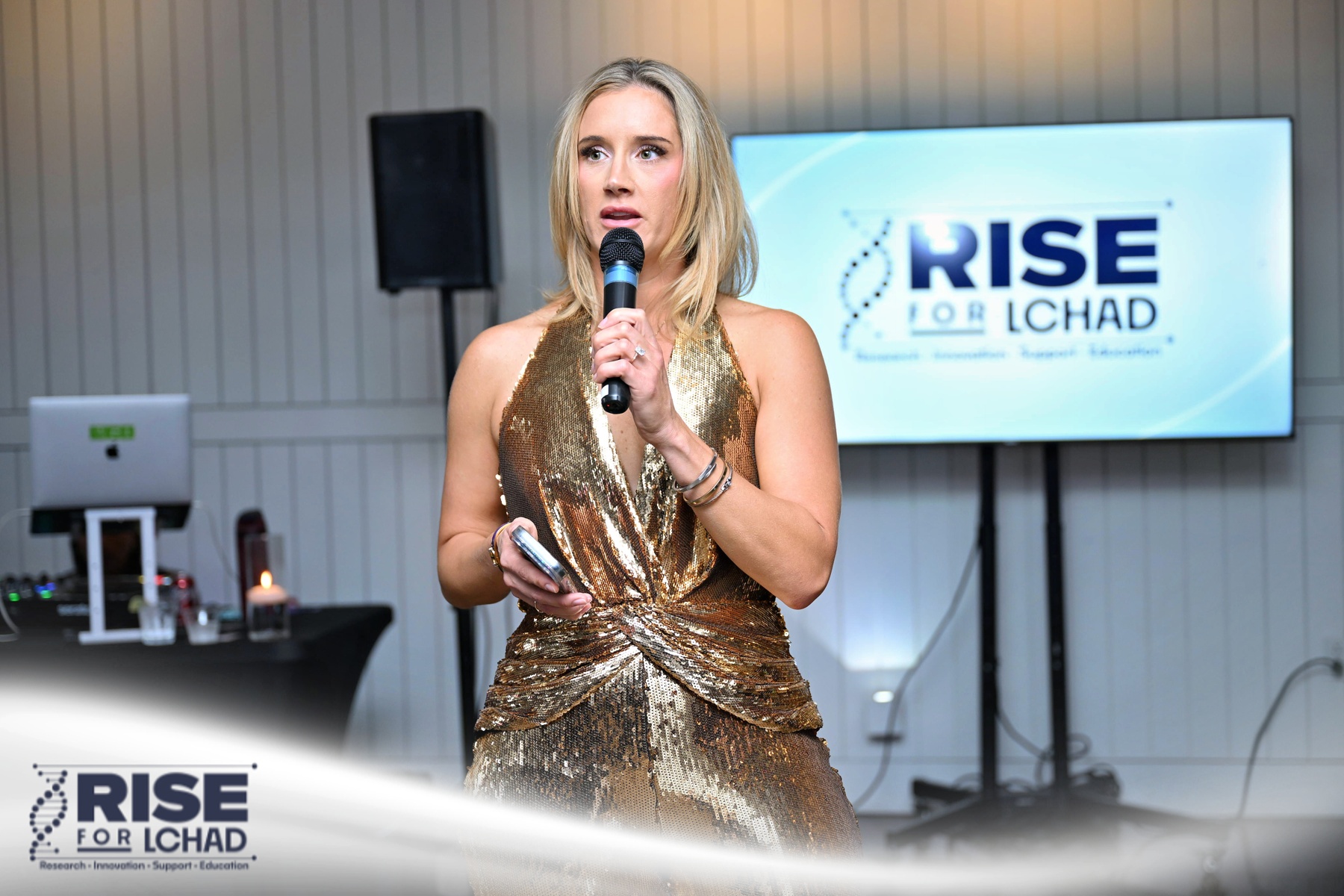 Host addressing guests during the gala program