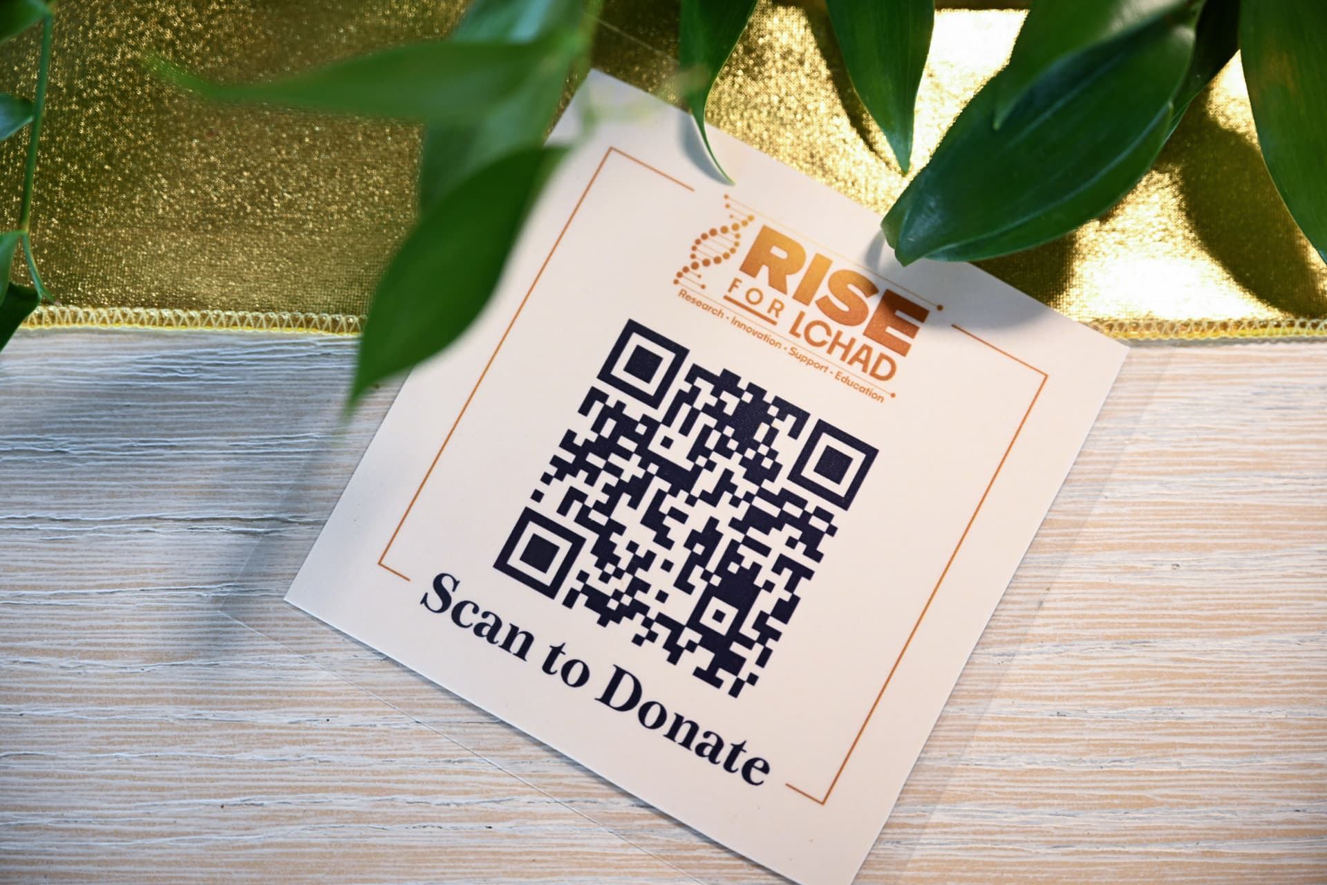 Scan to Donate card at a gala table