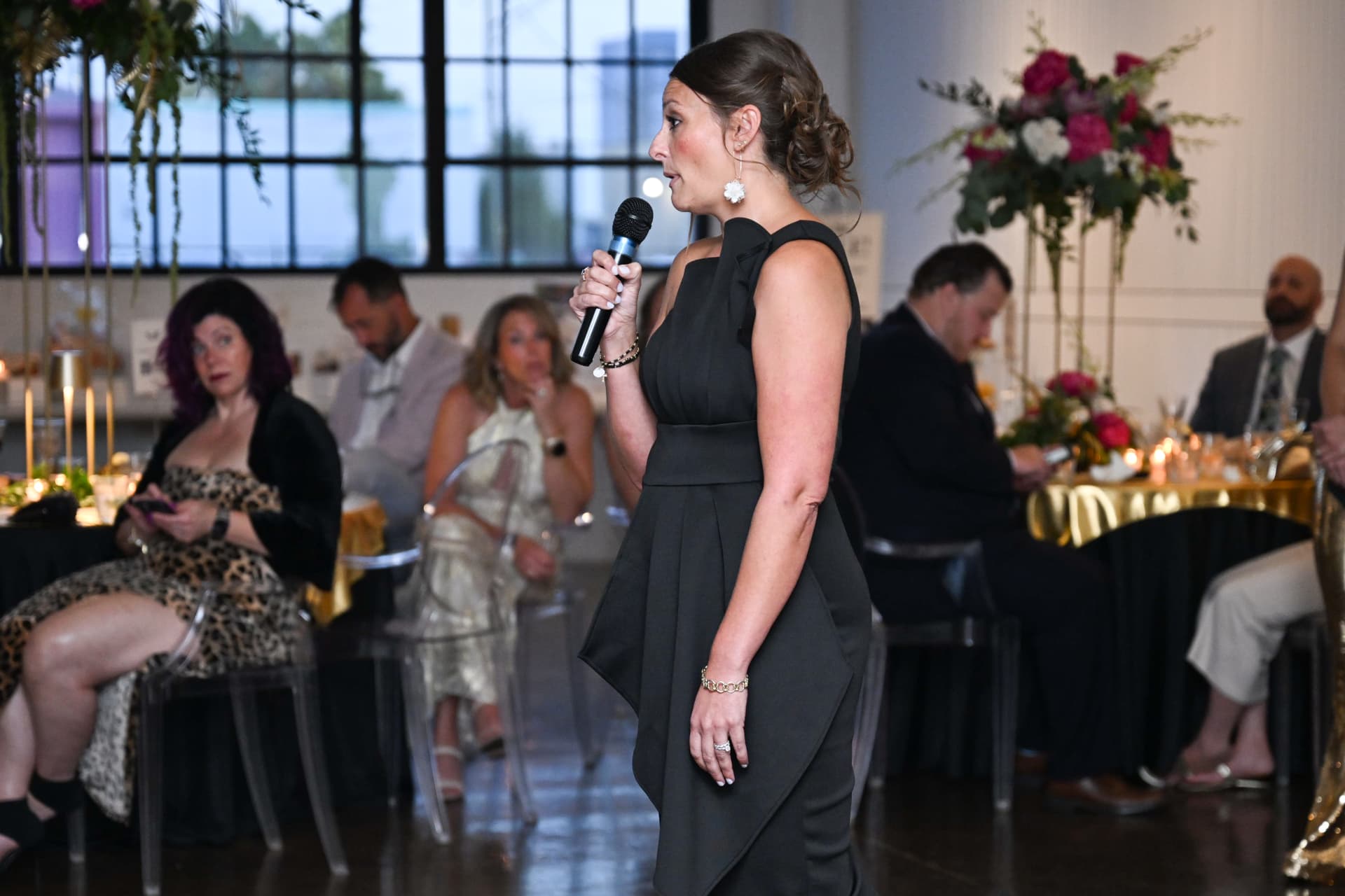 Speaker sharing remarks during the Fueling Hope Gala program