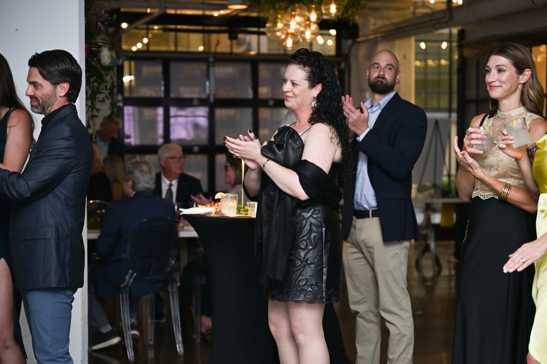 Attendees applauding during the gala program